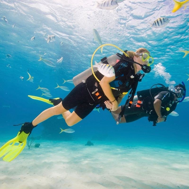 Divers enjoying clear warm water on a continuing education trip