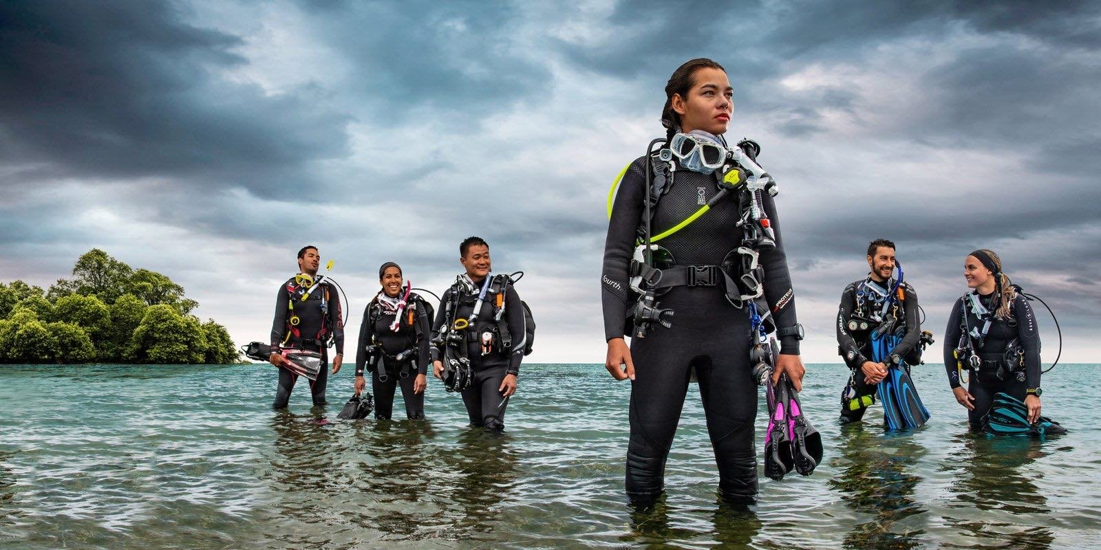 Divemaster candidates working through dive theory